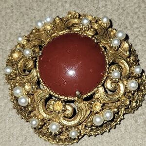 Elegant Gold and Red Brooch with Pearls